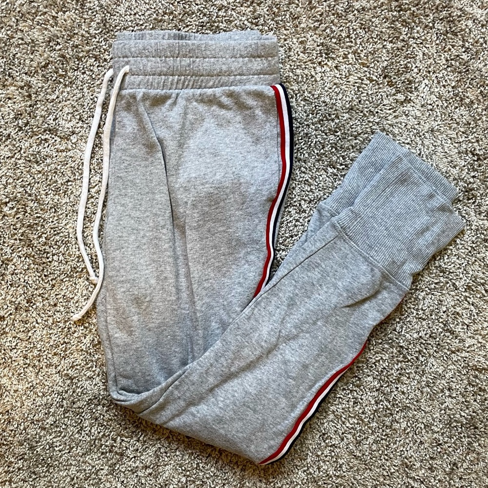 Gray joggers with red white and blue stripe